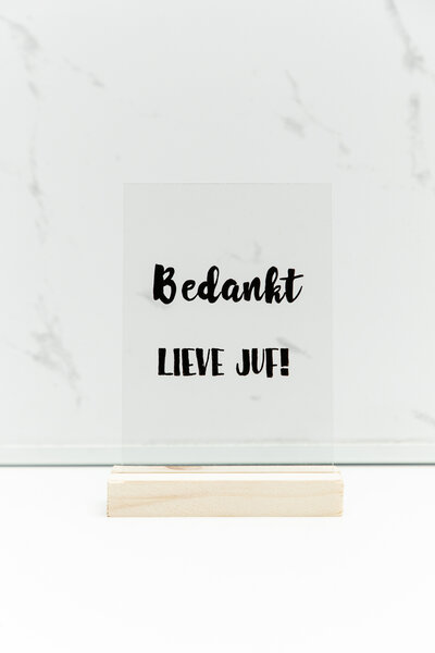 Blokje met tekst erop