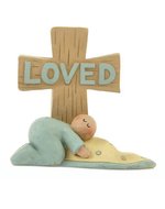 Beeld loved baby boy with cross